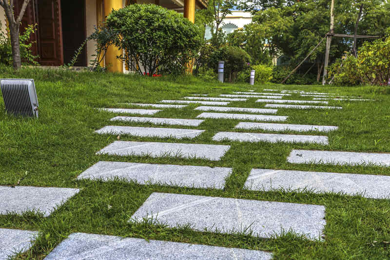 cleaning patio slabs with washing powder