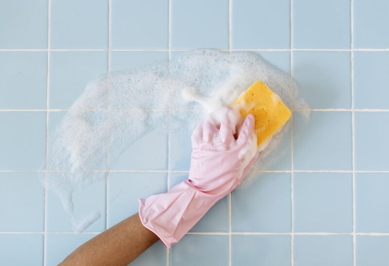 cleaning bathroom walls